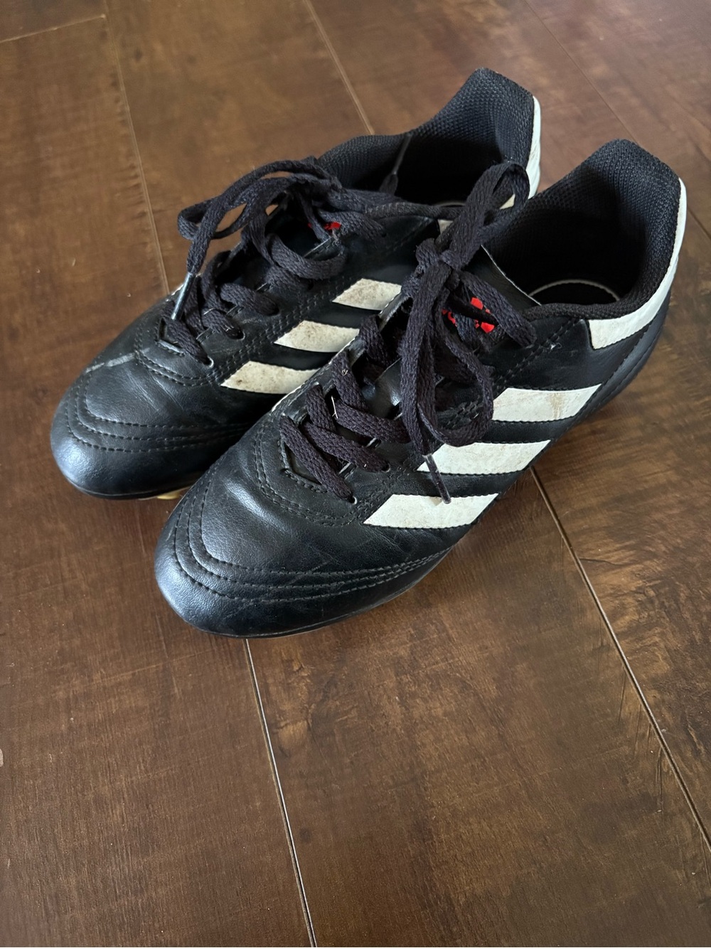 Adidas Boys Black Soccer Cleats with White Stripes